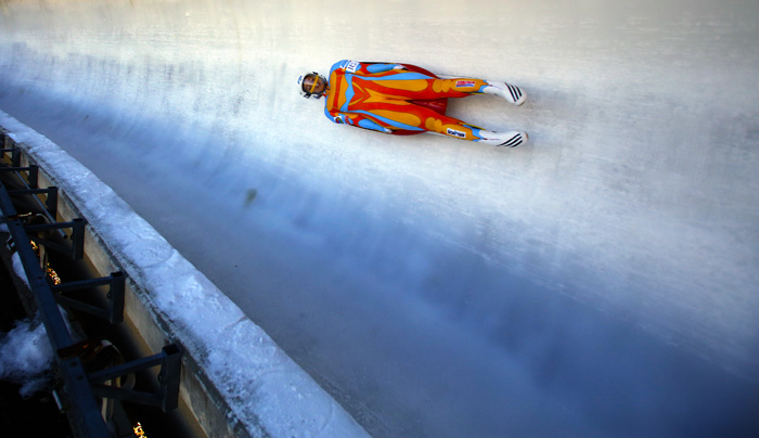 Kate Hansen makes her way down the track during the United States luge team trials Sunday Oct. 20, 2013, in Park City, Utah. (AP Photo/Jim Urquhart)